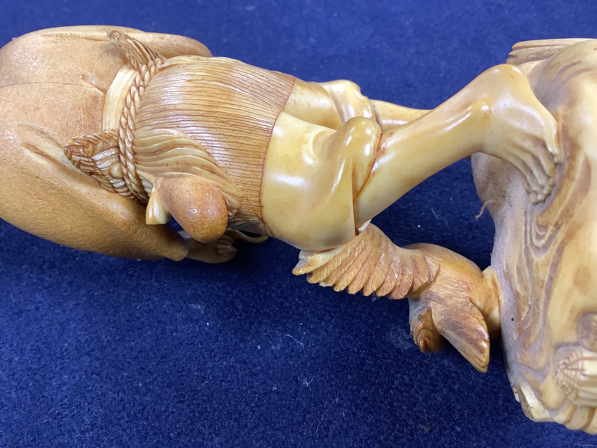 A Japanese ivory figure of a cormorant fisherman, early 20th century